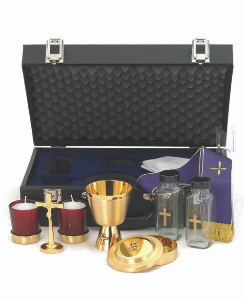 Chalice Ht. 4”. 6 oz. Host box cap. 60. Cross Ht. 3 ¾”. Cruets 4 oz. Candles 2”. Case w/lock 14 ½” x 9 ½” x 4 5/8”.