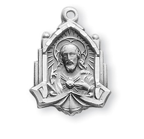 3/4" Sterling silver Scapular medal with an angel border showing the Sacred Heart of Jesus on the art deco cathedral shaped medal and Our Lady of Mount Carmel on the reverse. The medal comes with an 18" genuine rhodium plated chain in a deluxe velour gift box.