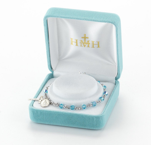 Aqua ~ Rosary Bracelet with 4mm Swarovski Crystal and Rondell Beads.
Choose: BR:) Rhodium plated solid brass findings with Sterling Silver Miraculous Medal and Crucifix;  or  BX.)Rhodium plated solid brass links with silver oxidized miraculous medal and crucifix.
Comes with a deluxe velour gift box. Made in the USA.