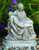 Cement Garden Pieta Statue. Pieta Statue comes in a natural cement finish. Dimensions: Height: 14", Width: 11", Length: 6", Weight: 34 lbs. Statue is handcrafted and made to order. Please allow 4-6 weeks for delivery. Made in the USA
 