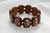 St Michael ~ These bracelets are made in Nicaragua and come with either brown or gold beads. Pictures may also vary. 