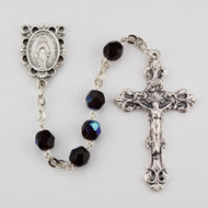 January ~ Garnet 
Fired Polished Glass Birthstone Rosaries with Miraculous Medal Centerpiece. Rosary is comprised of 6 millimeter fire polished glass beads. The Centerpiece is a silver oxidised Miraculous Medal  and a silver oxidised Crucifix.  Packaged in a deluxe gift box.