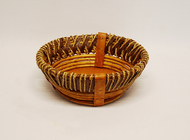 This basket is a small rustic style round basket. The small rustic basket measures 10" dia x 4 " deep. Lightweight and easy to handle!