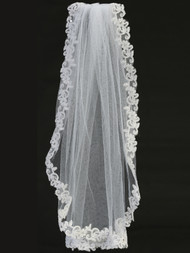 24" Veil on Comb. Veil has a corded lace trim. 