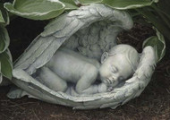 Sleeping Baby In  Wings Figure. 7"H 14.25"W 7.5"D. Resin/ Stone Mix