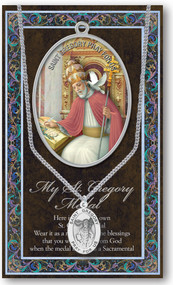 Patron Saint of Teachers and England. 3" X 5" vinyl folder with removable oxidized medal.  1.125" Genuine Pewter Saint Medal on a Stainless Steel Chain. Silver Embossed Pamphlet with Patron Saint Information and Prayer Included. Biography/History of the Saint and gives the Patron's attributes, Feast Day and Appropriate Prayer. (3.25"x 5.5")