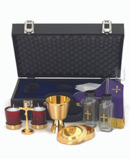 Chalice Ht. 4”. 6 oz. Host box cap. 60. Cross Ht. 3 ¾”. Cruets 4 oz. Candles 2”. Case w/lock 14 ½” x 9 ½” x 4 5/8”.