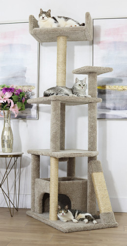 Spacious enclosed cat house at base of large cat tree for secure lounging and privacy