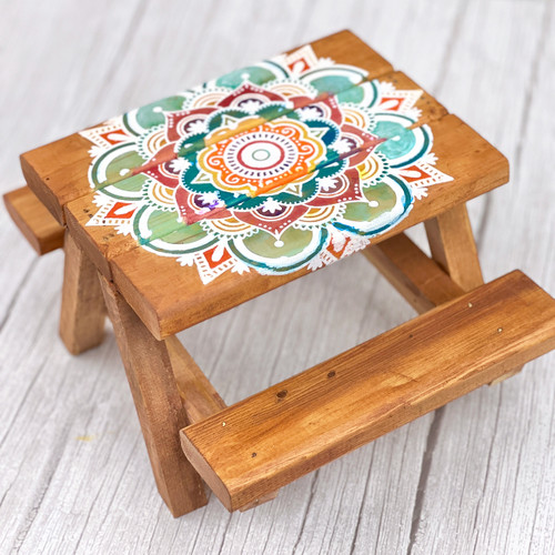 free mandala svg on wood table with unicorn spit and ikonart stencil