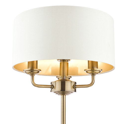 Sorrento Antique Brass 3 Light Table Lamp with Ivory Shade