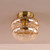 Alcella Wall/Ceiling Light Natural Brass and Amber Dimple Glass