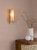 Bevin Bathroom Wall Light Natural Brass and Amber Ribbed Glass IP44