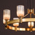 Hilaria 9 Light Pendant Antique Gold and Amber Ribbed Glass