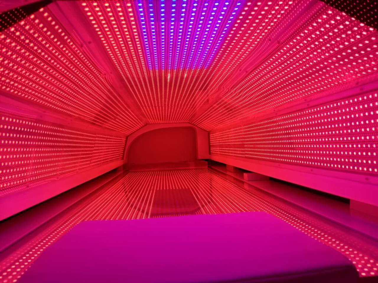 bed with red led lights