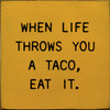 When Life Throws You A Taco, Eat It. | Shown in Gold with Black | Wooden Taco Signs | Sawdust City Wood Signs