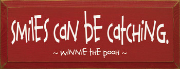 Smiles can be catching. ~ Winnie the Pooh |Wood Sign With Famous Quotes | Sawdust City Wood Signs