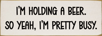 I'm holding a beer. So yeah, I'm pretty busy - Funny Wood Sign