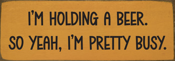 I'm holding a beer. So yeah, I'm pretty busy - Funny Wood Sign