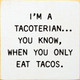 I'm A Tacoterian... You Know, When You Only Eat Tacos. |  Shown in Cottage White with Black | Wooden Taco Signs | Sawdust City Wood Signs