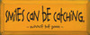 Smiles can be catching. ~ Winnie the Pooh |Wood Sign With Famous Quotes | Sawdust City Wood Signs