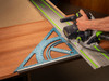 Utilize your precision triangle as a large guide rail square for perfect 90 degree cuts.
