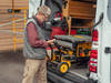Fence stows under the saw, just like the original DeWalt fence.
