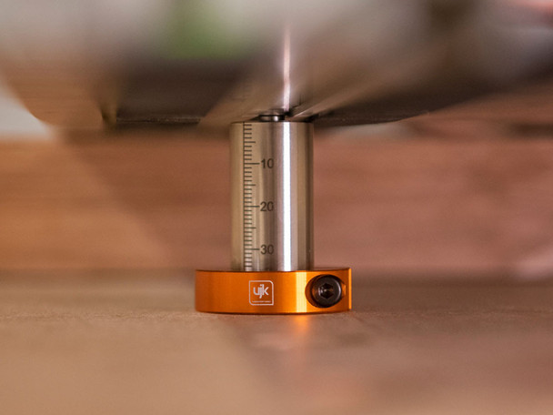 Set the locking collar to the desired height for easy repeatable cuts.