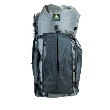 black talon connested to front of a backpack with gatekeeper straps