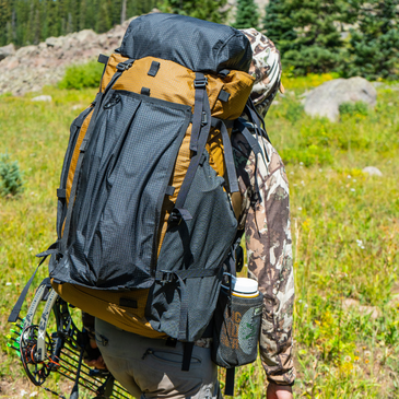 A hunter wearing a goshawk 4800ci backpack, with talon and top lid