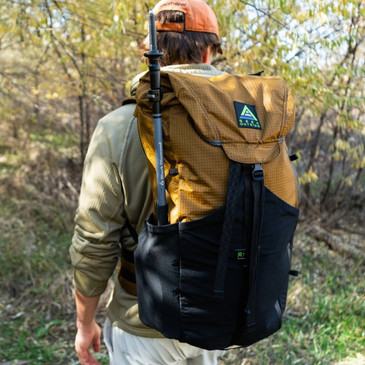 Backpacker with Silverton pack, integrated top lid with drawstring closure, UltraStretch side water bottle pockets