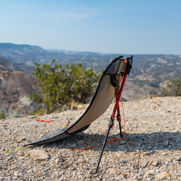 Sitting saddle on hill