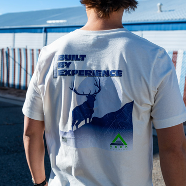 Man wearing t-shirt with elk illustration