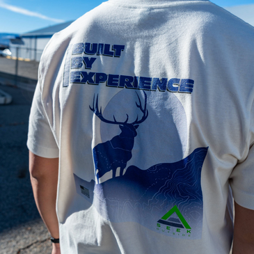 Man wearing t-shirt with elk illustration