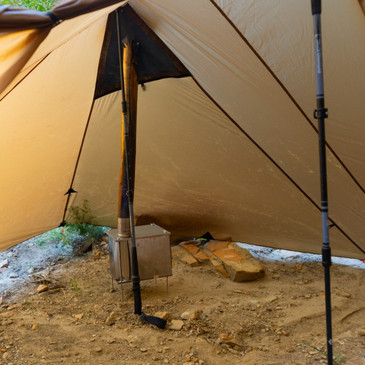 Silex hot tent setup with titanium stove pipe exiting through stove jack at peak, 50-inch height, 17 oz canopy with 3 oz stove jack