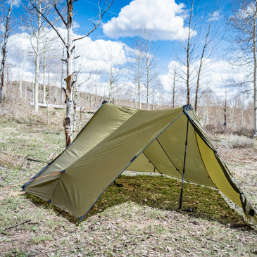 Seek Outside Guardian shelter supported by trekking poles, 103-inch length, 140-inch vestibule span, 30D silnylon canopy taut
