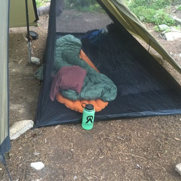 Cimarron Half Nest inside tent with two full-sized sleeping pads and sleeping bags side by side