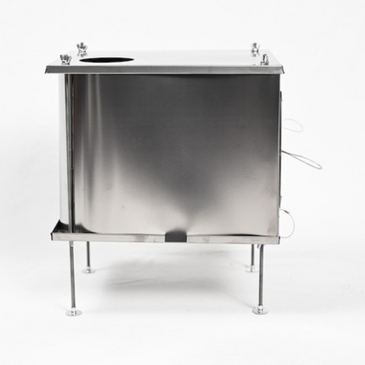 Seek Outside U-Turn titanium stove side angle showing box-style construction with foil sides and front sliding door