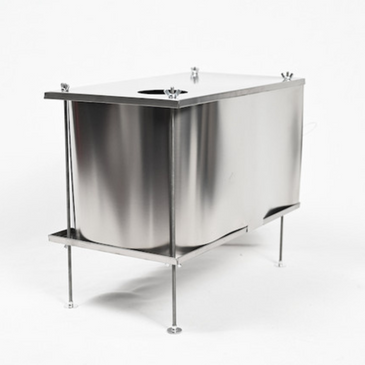 Seek Outside U-Turn titanium stove side angle showing box-style construction with foil sides and front sliding door