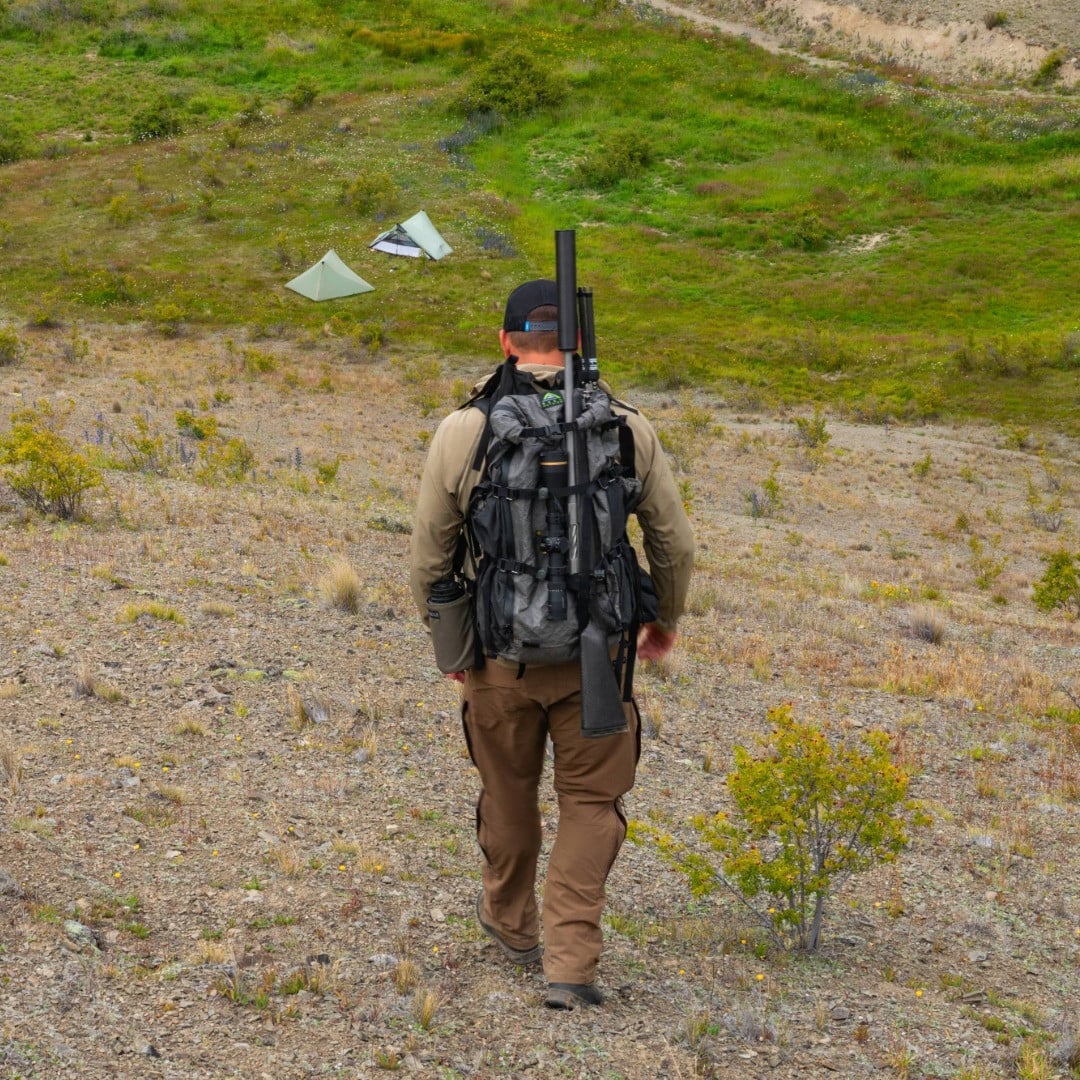 Seek Outside Goshawk 6300 with rifle secured by Gatekeeper compression straps, 45-inch unrolled height, Breakaway Carry system for meat packing