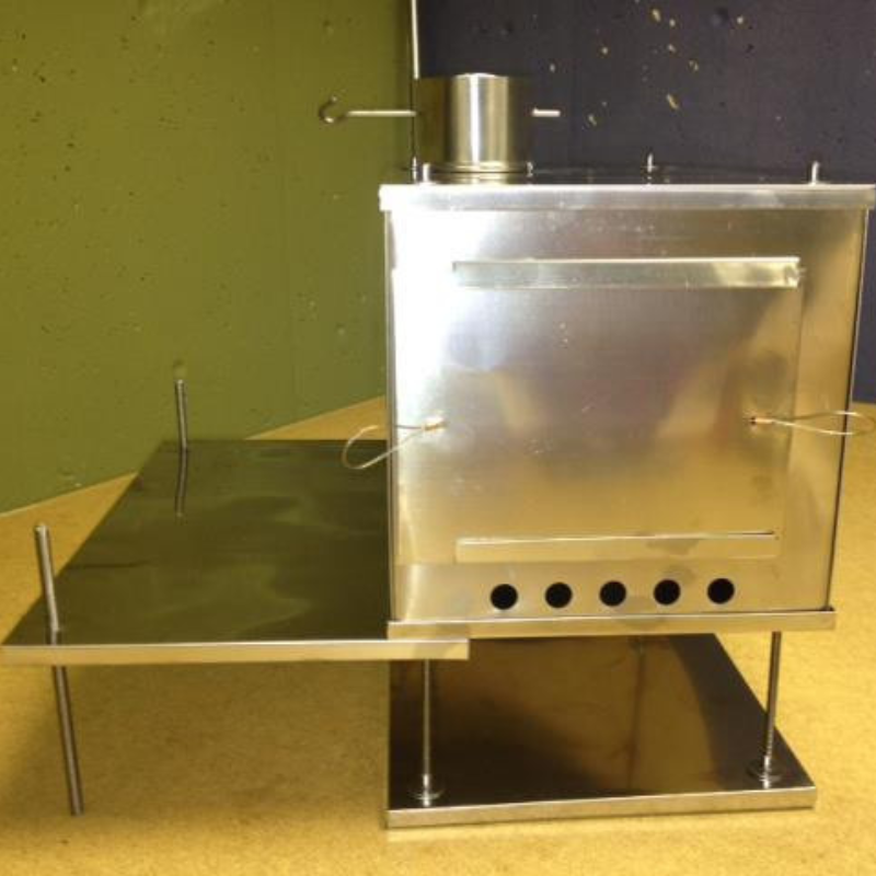 utility tray can be attached to side of stove as a shelf or under the stove as a snow platform 