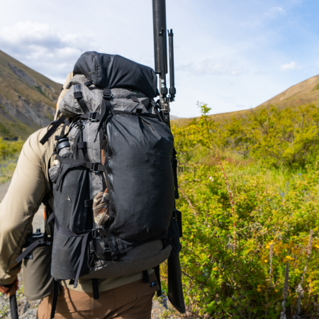 a hunter carries a Goshawk 4800ci backpack, loaded with gear
