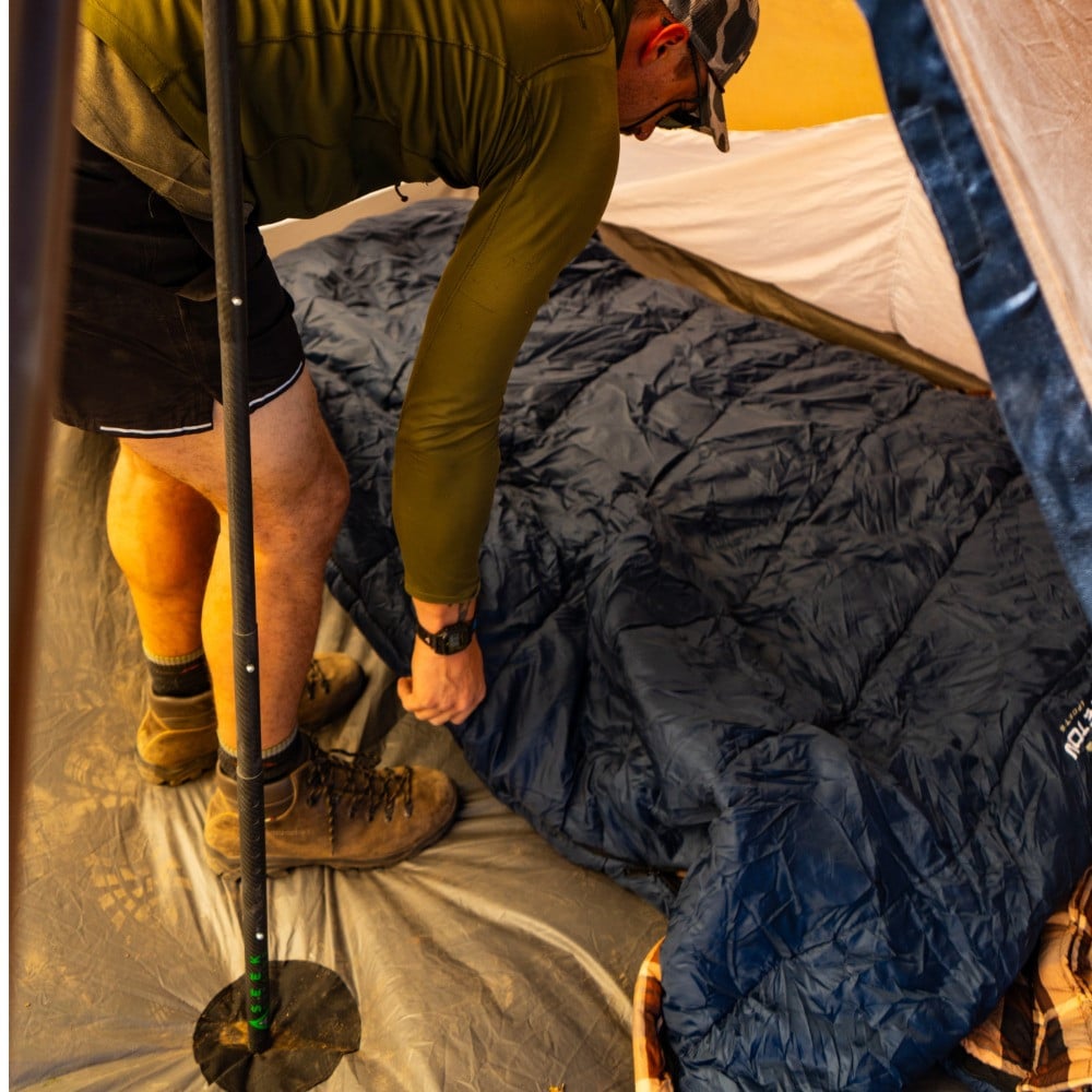 Seek Outside Redcliff Floor Liner in hunting camp, full floor coverage, 14'10" center length, 10'10" center width