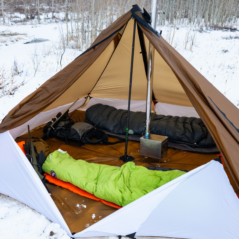 Cimarron Floor Liner inside tent with two sleeping pads, stove setup, and gear organized, 94 square feet full floor coverage, 21-inch wall liner