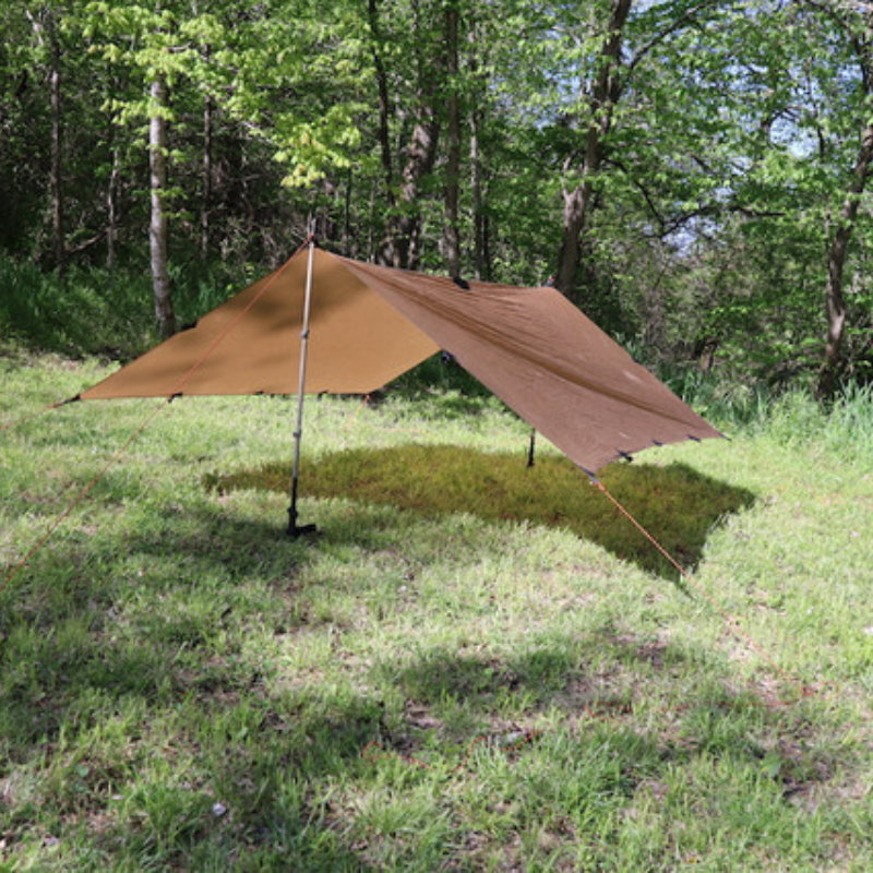 Seek Outside DST Tarp raised high in A-frame configuration, providing covered space with 3000mm hydrostatic head waterproofing