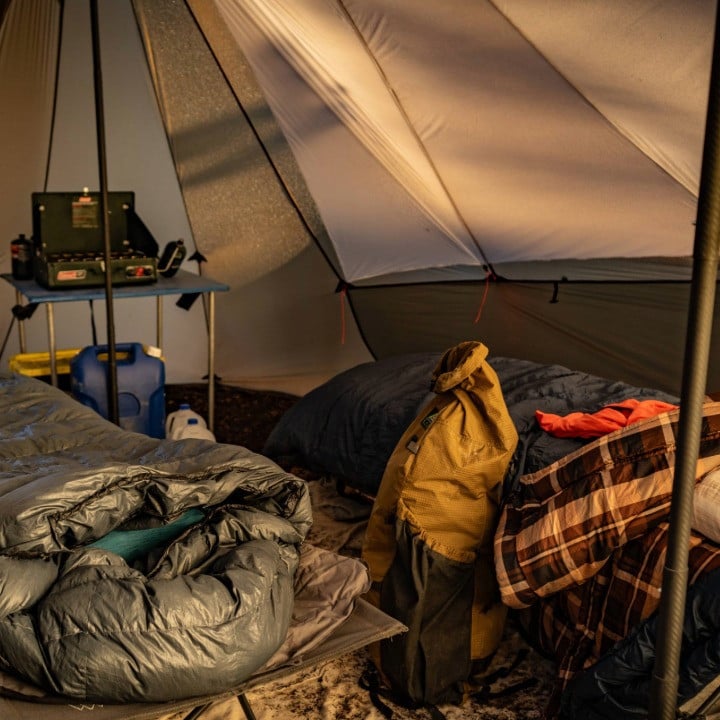 interior of bookcliff tent, cots and camping gear inside and Liner attached to loops along the tent walls