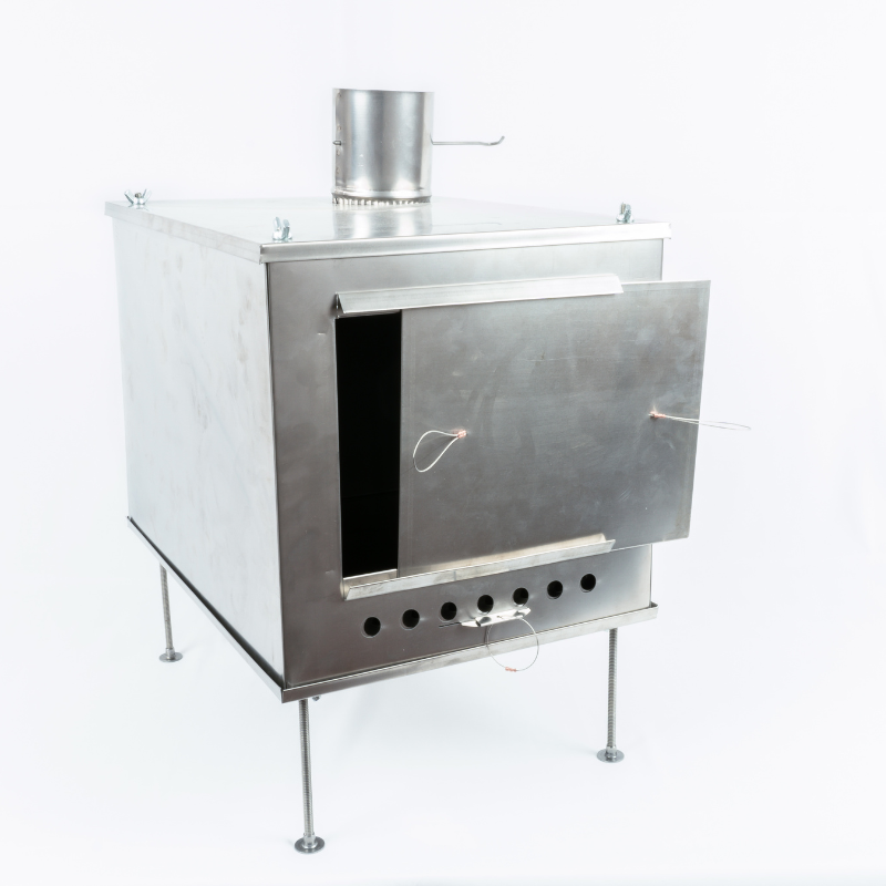 Seek Outside ultralight titanium stove front view with sliding door, front intake control, and legs attached
