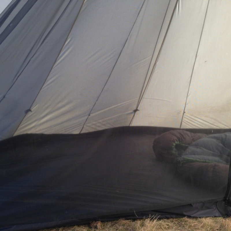 Empty 8-person half nest inside tipi showing 40D HyperD bathtub floor and full mesh netting up to tent peak