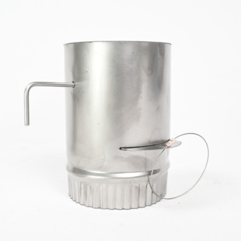 out side view of damper with spark arrestor bar and damper slide loop visible