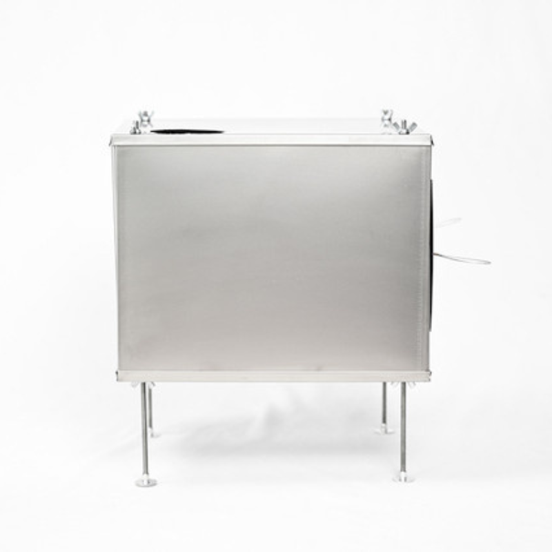 medium ultralight stove side view showing lightweight titanium side panels and flat cooking top