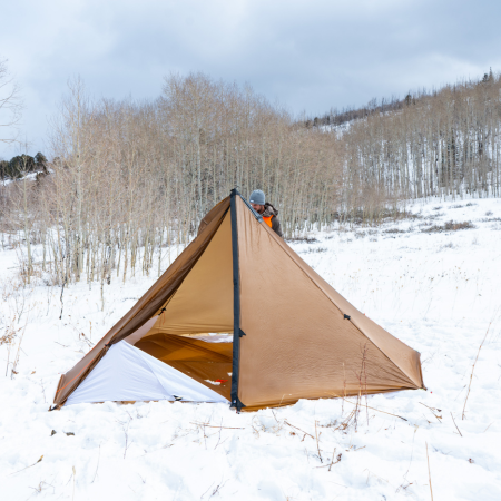 Cimarron 2.0 tent pitched on snow with Cimarron Floor System installed, bathtub-style floor with 21-inch wall liner for condensation control